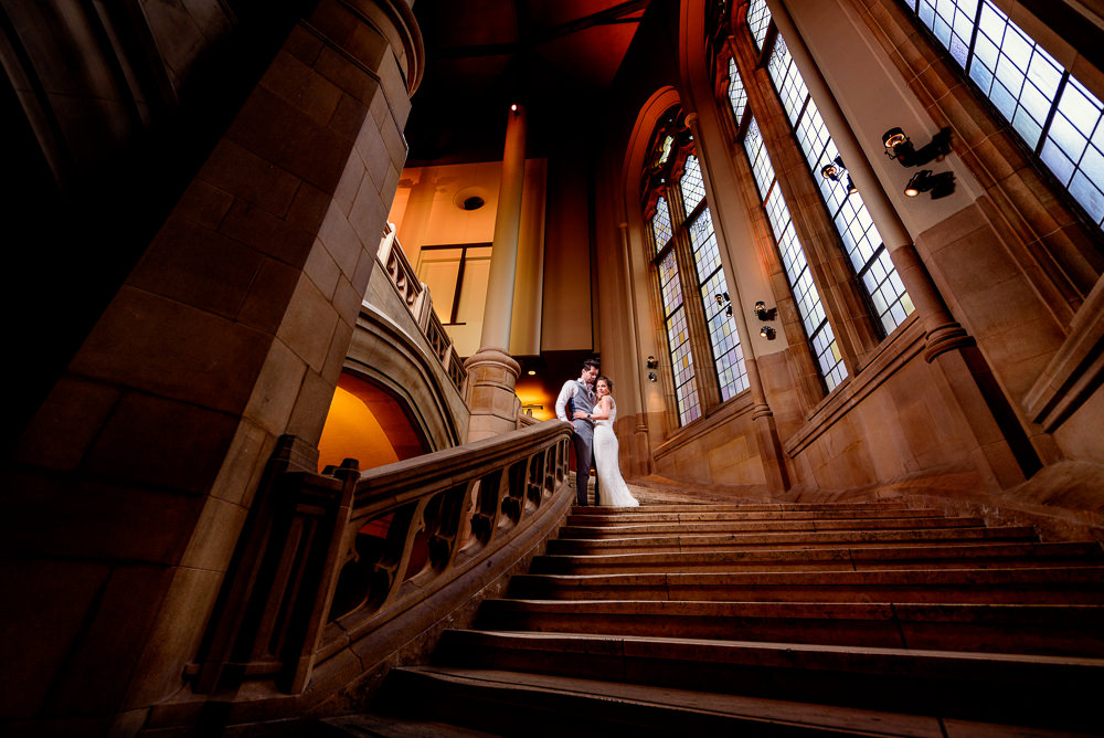 Couple standing on huge staircase in the Suzzallo library, Epic Couple’s Session in Seattle, Lazzat Photography, Engagement photos, wedding photos