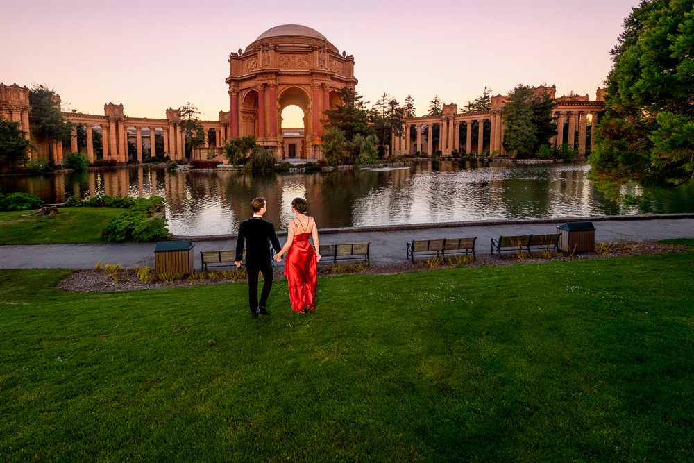 Natalie and Crockett walking away at the Epic Couple's Session at Palace of Fine Arts in San Francisco | Lazzat Photography