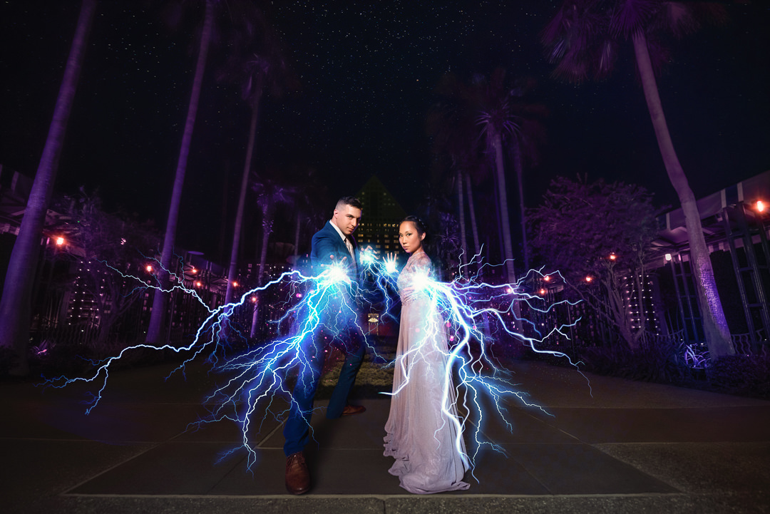 Magical Disney Engagement Session | couple posing with lightning