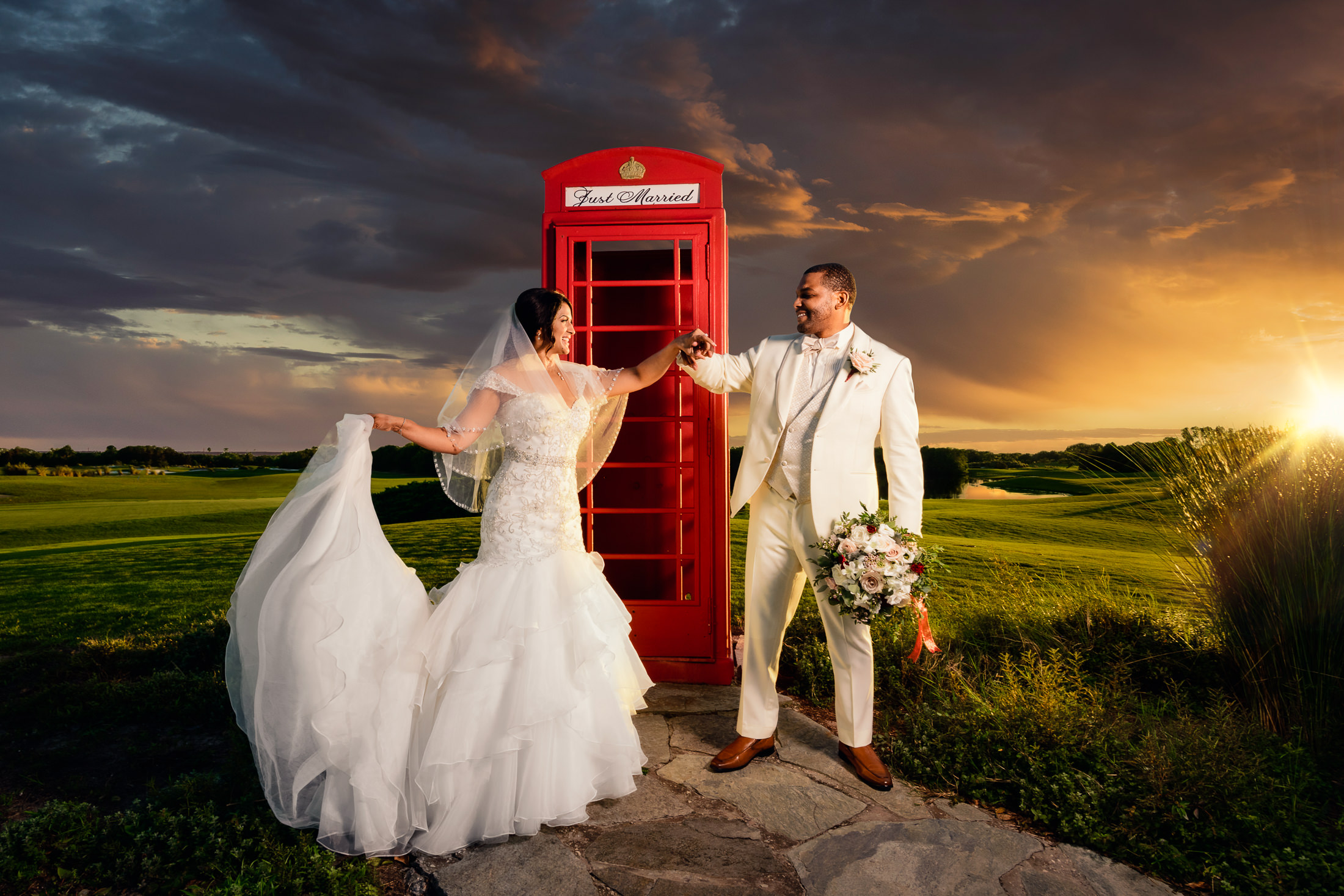 The Royal Crest Room Wedding | bride and groom in front of telephone booth